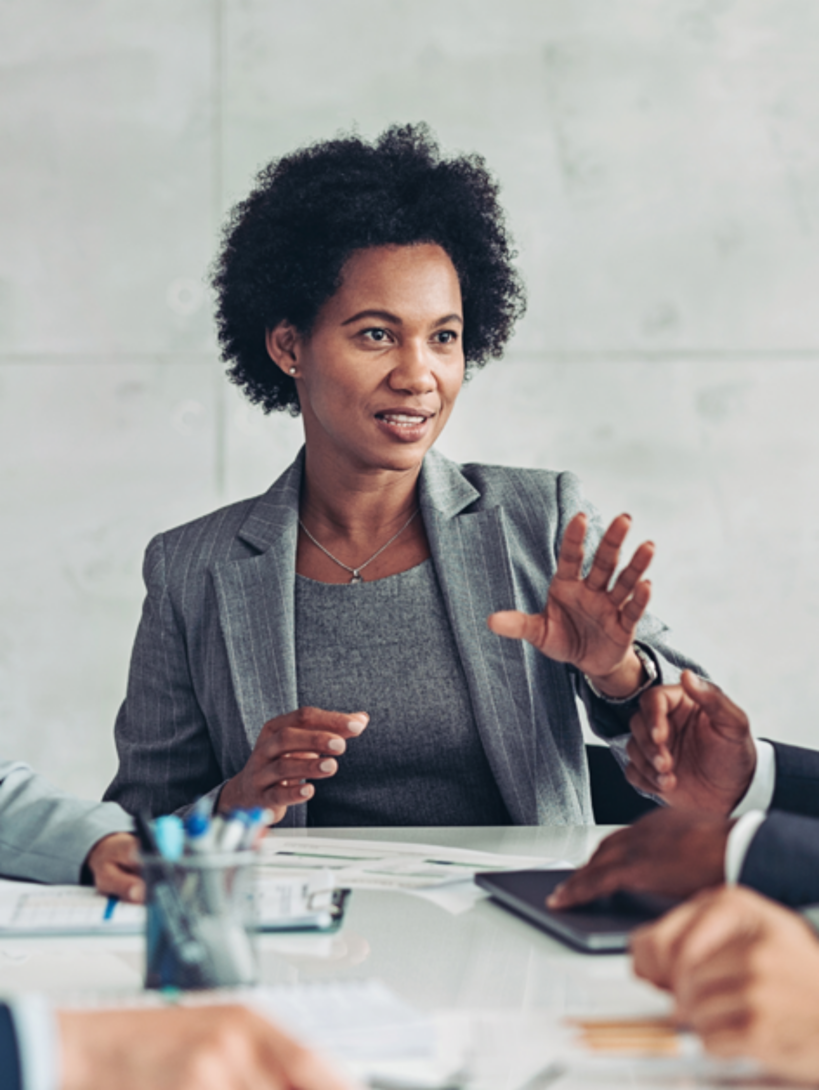 Employees of a finance company at a board meeting